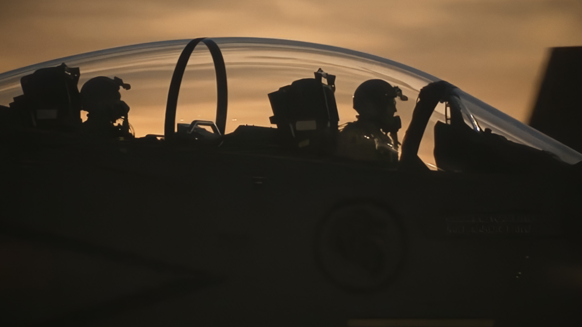 A closeup of a F-15E Canopy at sunset